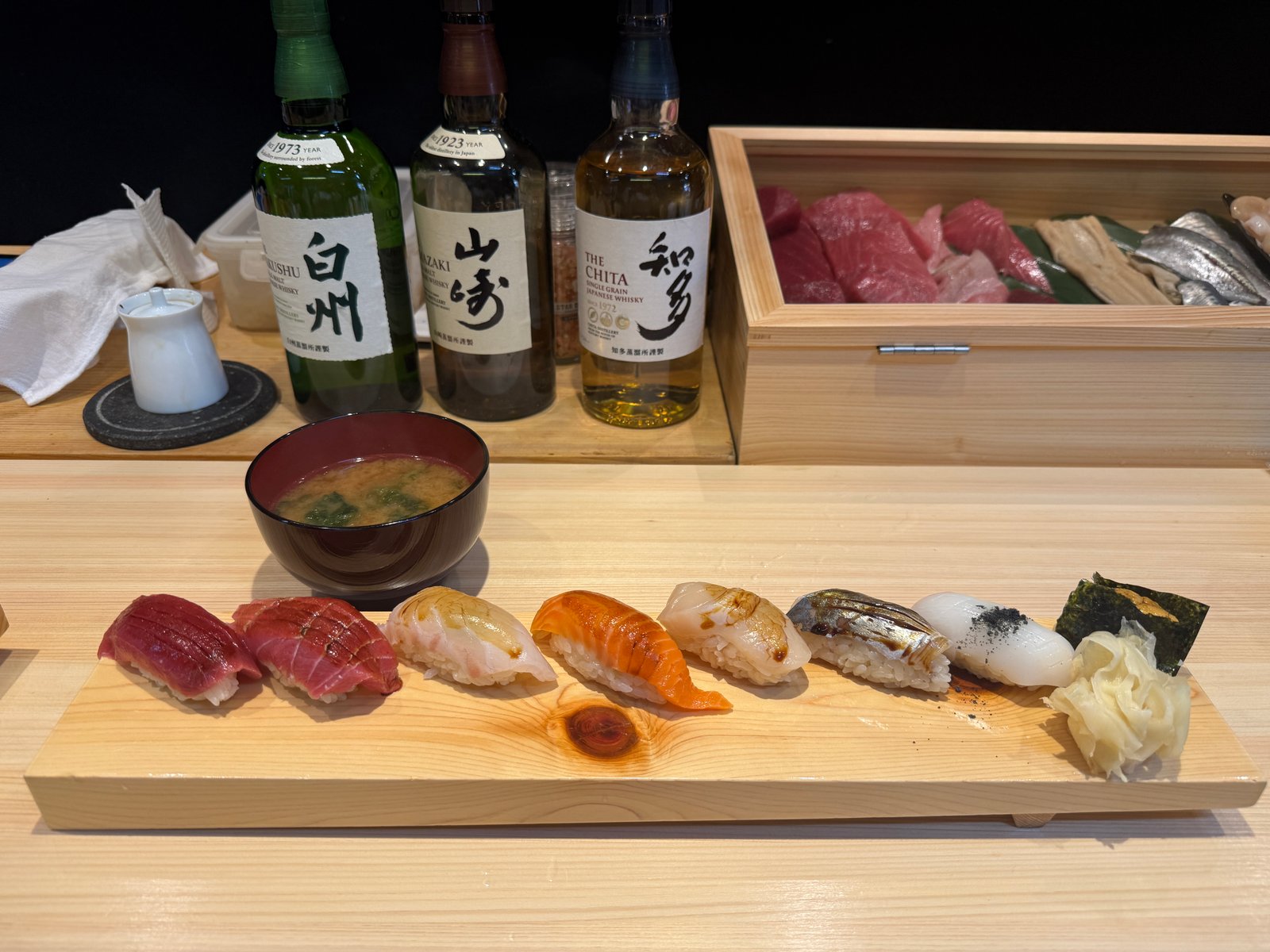 Fresh sushi served at a wooden counter